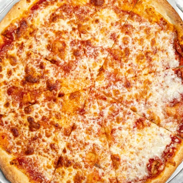 A whole cheese pizza from Habibi's Cafe & Pizzeria, sliced into eight pieces.